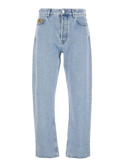 Gucci Men Light Blue Jeans With Gg Detail On The Pocket And Logo Patch On The Rear In Denim Man In Blue