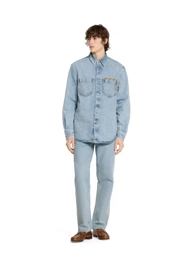 Gucci Men Light Blue Jeans With Gg Detail On The Pocket And Logo Patch On The Rear In Denim Man In Blue
