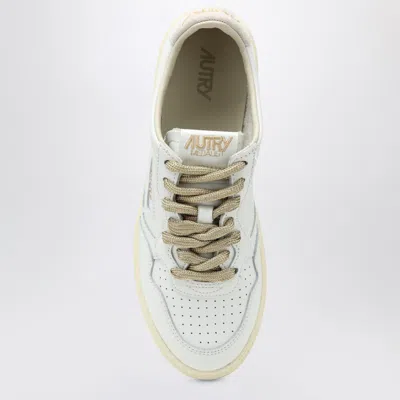 Autry Low-top Sneakers With Suede Accents And Golden Details