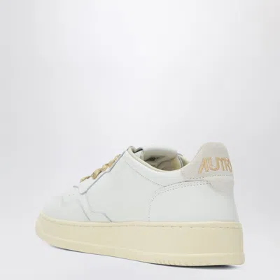 Autry Low-top Sneakers With Suede Accents And Golden Details