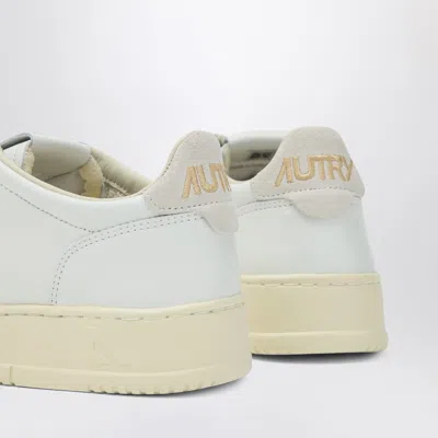 Autry Low-top Sneakers With Suede Accents And Golden Details