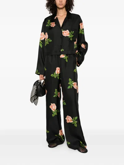 Nanushka Arvenn Rose-print Elastic-waist Trousers In Black