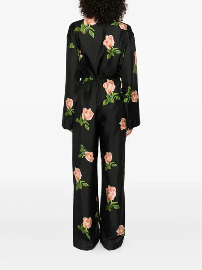 Nanushka Arvenn Rose-print Elastic-waist Trousers In Black