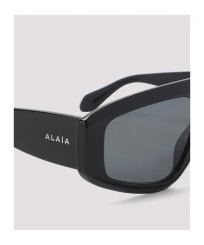 Alaïa Rectangular Frame Sunglasses Dark Lenses In Black