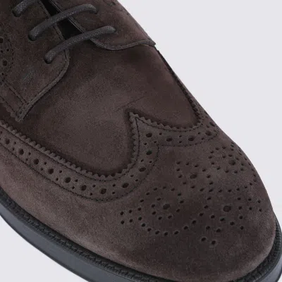Tod's Brown Wingtip Derby Shoes With Intricate Brogue Detailing