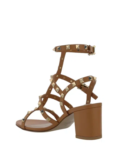 Valentino Rockstud Sandals In Brown