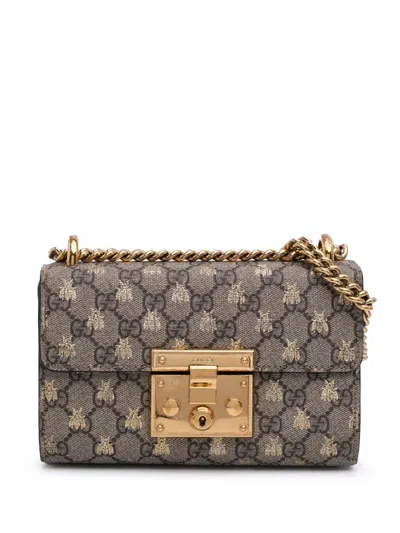 Pre-owned Gucci 2016-2025 Small Gg Supreme Bee Padlock Crossbody Bag In Brown
