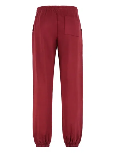 Sp5der Web-print Elastic-cuff Track Pants In Red