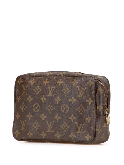 Pre-owned Louis Vuitton 1985 Monogram Trousse Toilette 23 Clutch Bag In Brown