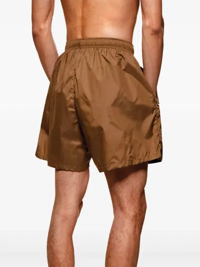Mki Miyuki Zoku Logo-embroidered Shell Swim Shorts In Brown