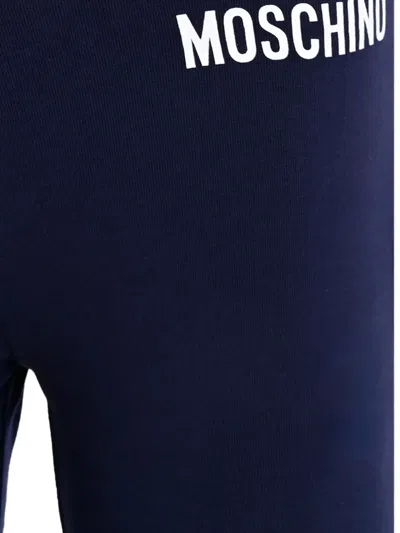 Moschino Logo-waistband Flared Trousers In Black