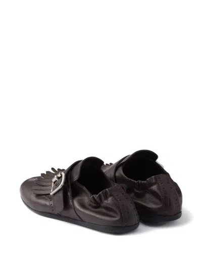 Prada Fringed Buckle Shoes