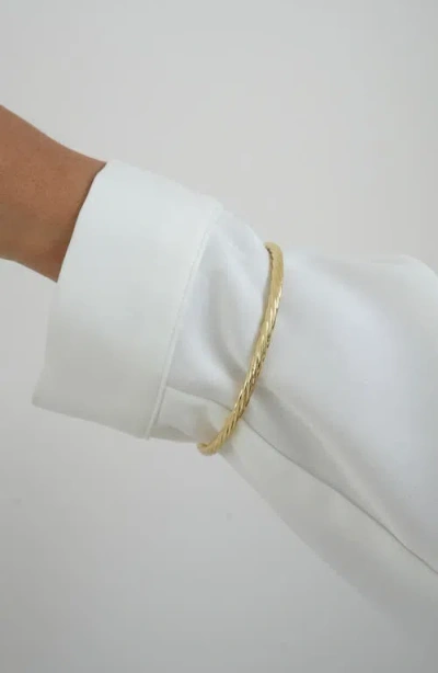 Argento Vivo Sterling Silver Twisted Bangle Bracelet In Gold