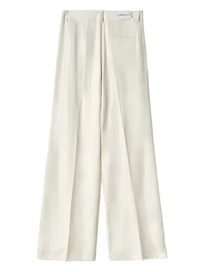 Hinnominate Pleated-details Trousers In Neutral