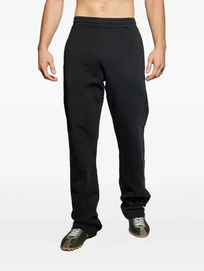 Mm6 Maison Margiela Track Pants With A Stretchy Waistband In Black
