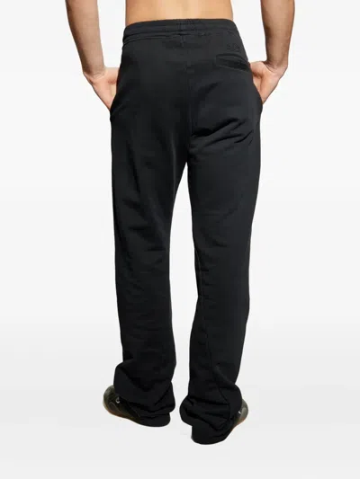 Mm6 Maison Margiela Track Pants With A Stretchy Waistband In Black