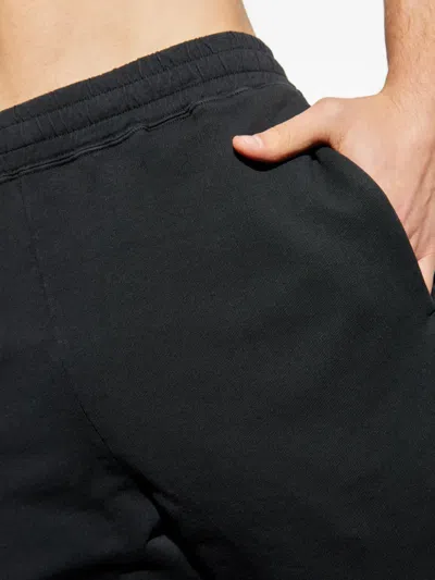 Mm6 Maison Margiela Track Pants With A Stretchy Waistband In Black