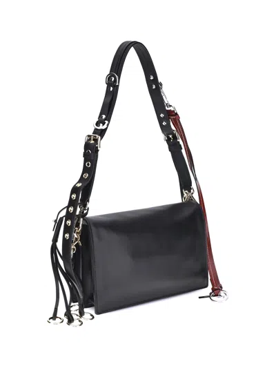 Prada Soft Sound Large Leather Shoulder Bag With Charms In Black