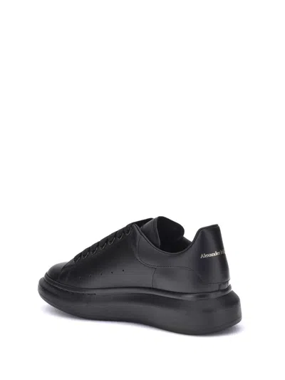 Alexander Mcqueen Black Sneakers With Logo Lettering On The Rear And Oversize Rubber Sole In Leather