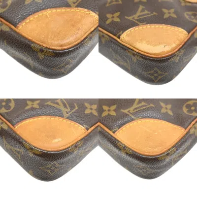 Pre-owned Louis Vuitton Marly Dragonne Brown Canvas Clutch Bag ()