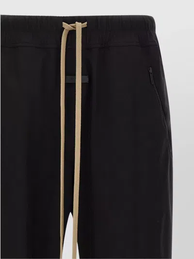 Fear Of God Elastic Waistband Trackpant Joggers With Side Zip Pockets In Black