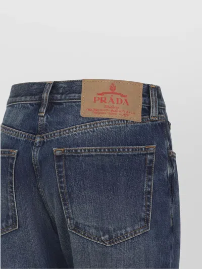Prada Low-waist Tapered Bleached Denim Trousers