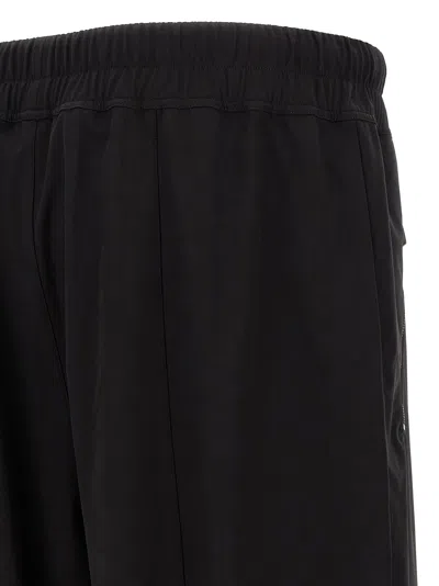 Fear Of God Elastic Waistband Trackpant Joggers With Side Zip Pockets In Black