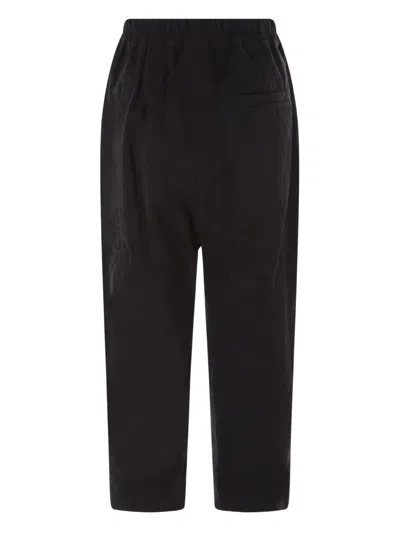 By Walid Floral-embroidered Elasticated-waist Trousers In Black