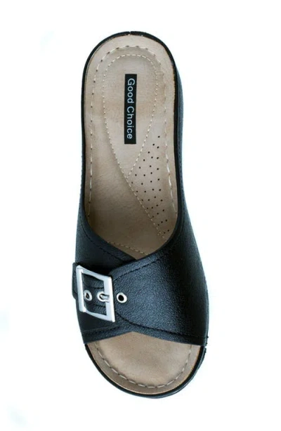 Gc Shoes Justina Buckle Wedge Sandal In Black