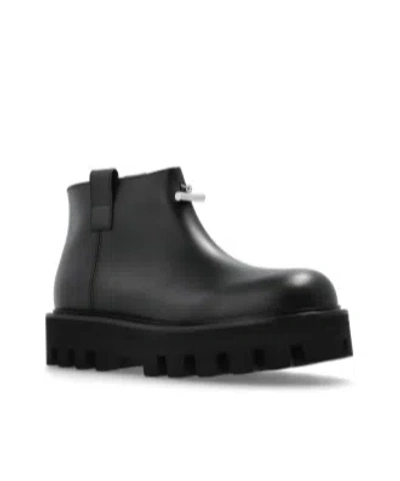 Alexander Mcqueen Zip-fastening Lug-sole Boots In Black