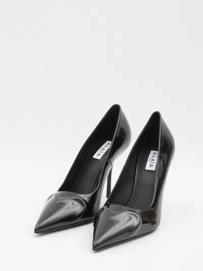 Alaïa Patent Leather Heart Cut Pumps