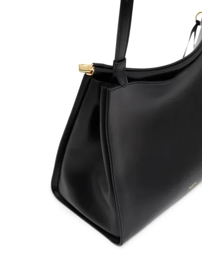 Alaïa Le Click Medium Curve Shoulder Bag In Glossy Leather