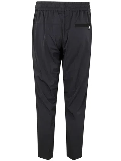 Devore Incipit Trousers In Black