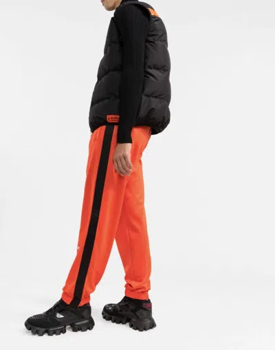 Heron Preston Ctnmb Logo Trackpants In Orange