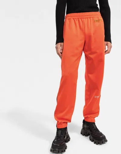 Heron Preston Ctnmb Logo Trackpants In Orange
