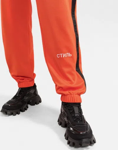Heron Preston Ctnmb Logo Trackpants In Orange