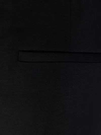 Loewe Trousers With Pleated Design And Pockets In Black