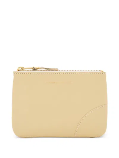Comme Des Garçons Play Logo Curved-stitching Zip Wallet In Yellow