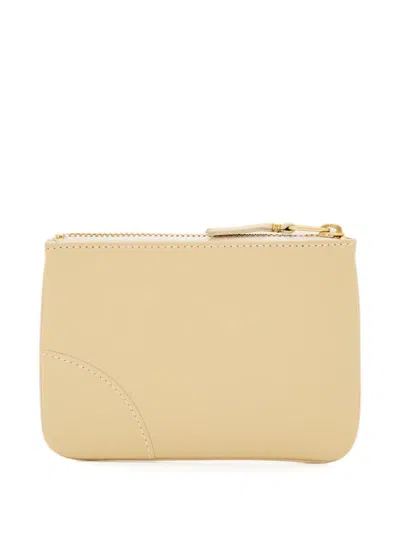 Comme Des Garçons Play Logo Curved-stitching Zip Wallet In Yellow