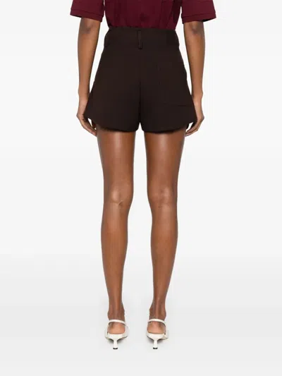 Sandro Buttoned Carpenter Shorts In Brown