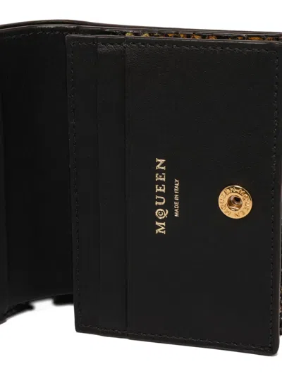 Alexander Mcqueen Snakeskin-print Wallet In Brown