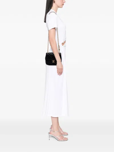 Pre-owned Chanel 2021-2025 Mini Quilted Lambskin Bijoux Logo Chain Square Flap Crossbody Bag In Black