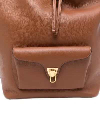 Coccinelle Medium Beat Generation Drawstring Bucket Bag In Brown