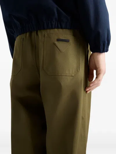 Prada Triangle-logo Patch-pocket Trousers In Green