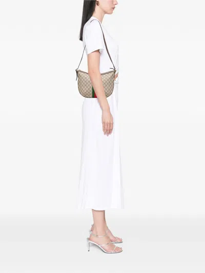 Pre-owned Gucci 2016-2025 Small Gg Supreme Web Ophidia Half Moon Crossbody Bag In Brown