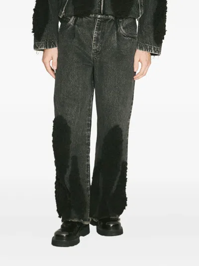 Song For The Mute Frayed-hem Shearling-panel Jeans In Black