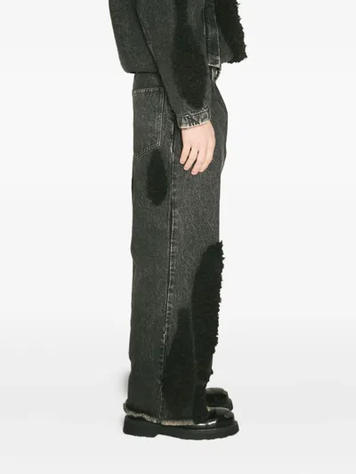 Song For The Mute Frayed-hem Shearling-panel Jeans In Black