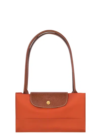 Longchamp 'le Pilage Original' Red Medium Tote Bag With Two Top Handles And Embossed Logo On The Front In Canv