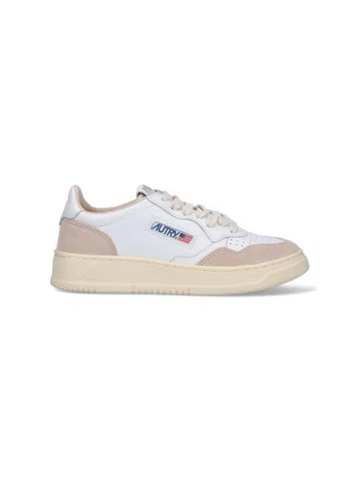 Autry Low Sneaker With Perforated Detailing And Contrast Panel In White