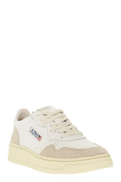 Autry Low Sneaker With Perforated Detailing And Contrast Panel In White